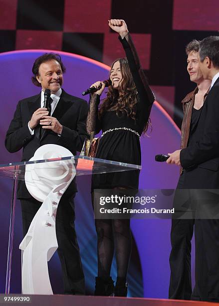 French singer Izia receives an award during the 25th Victoires de la Musique yearly French music awards ceremony at Zenith de Paris on March 6, 2010...