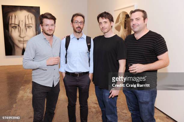 Guests attend the Tigran Tsitoghdzyan "Uncanny" show at Allouche Gallery on June 14, 2018 in New York City.