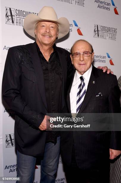 Songwriters Hall of Fame Inductee Alan Jackson and Clive Davis pose backstage during the Songwriters Hall of Fame 49th Annual Induction and Awards...