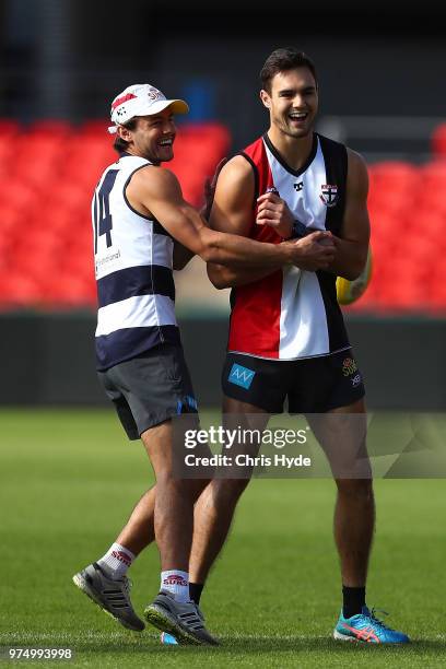 Lachie Weller and Jack Leslie during a Gold Coast Suns AFL training session at Metricon Stadium on June 15, 2018 in Gold Coast, Australia.