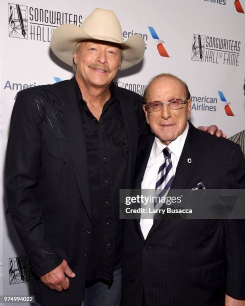 Songwriters Hall of Fame Inductee Alan Jackson and Clive Davis pose backstage during the Songwriters Hall of Fame 49th Annual Induction and Awards...