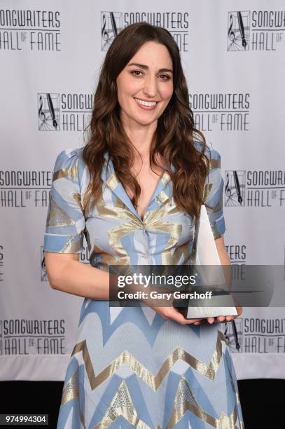 Hal David Starlight Award Honoree Sara Bareilles poses with an award backstage during the Songwriters Hall of Fame 49th Annual Induction and Awards...