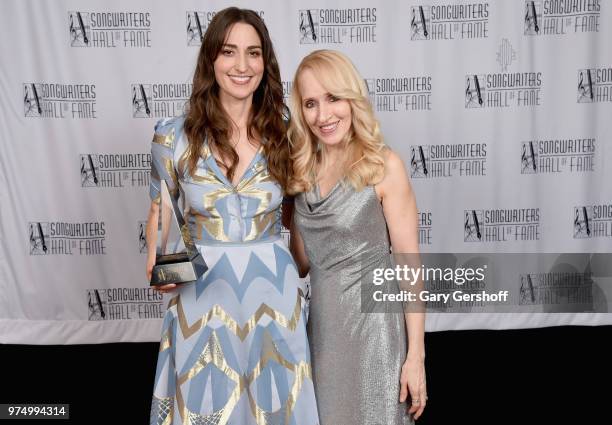 Hal David Starlight Award Honoree Sara Bareilles and April Anderson pose backstage during the Songwriters Hall of Fame 49th Annual Induction and...