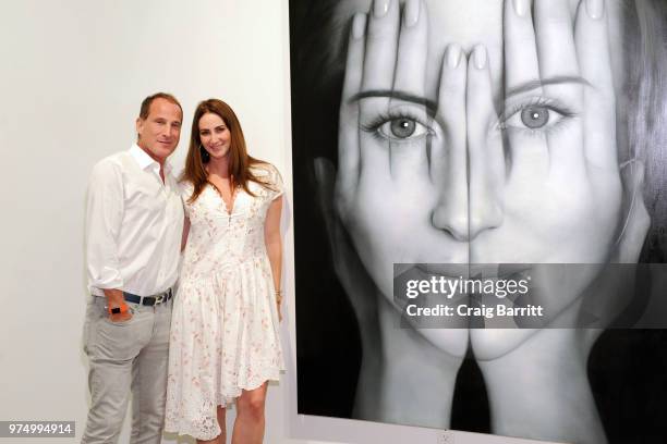 Josh Guberman and Meggan Guberman attend the Tigran Tsitoghdzyan "Uncanny" show at Allouche Gallery on June 14, 2018 in New York City.