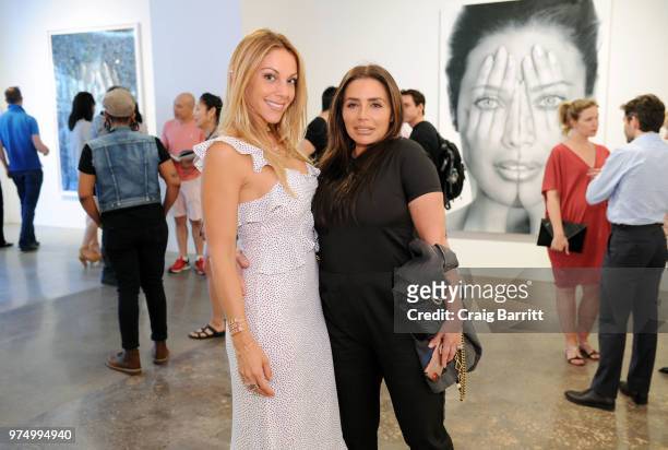 Morgan Shara and Taja Cone attend the Tigran Tsitoghdzyan "Uncanny" show at Allouche Gallery on June 14, 2018 in New York City.