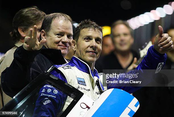 Scott Pruett and Chip Ganassi celebrate after winning the Grand Prix of Miami at Homestead-Miami Speedway on March 6, 2010 in Homestead, Florida.