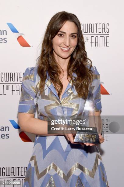Hal David Starlight Award Honoree Sara Bareilles poses with an award backstage during the Songwriters Hall of Fame 49th Annual Induction and Awards...