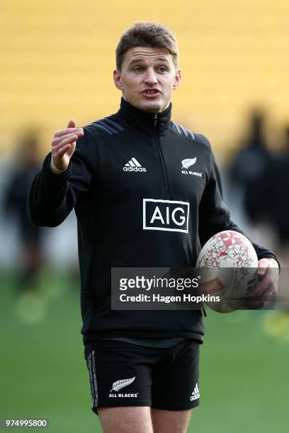 Beauden Barrett talks to a teammate during the New Zealand All Blacks Captain's Run at Westpac Stadium on June 15, 2018 in Wellington, New Zealand.