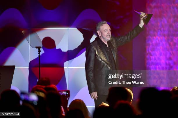 Neil Diamond accepts the Johnny Mercer Award onstage during the Songwriters Hall of Fame 49th Annual Induction and Awards Dinner at New York Marriott...
