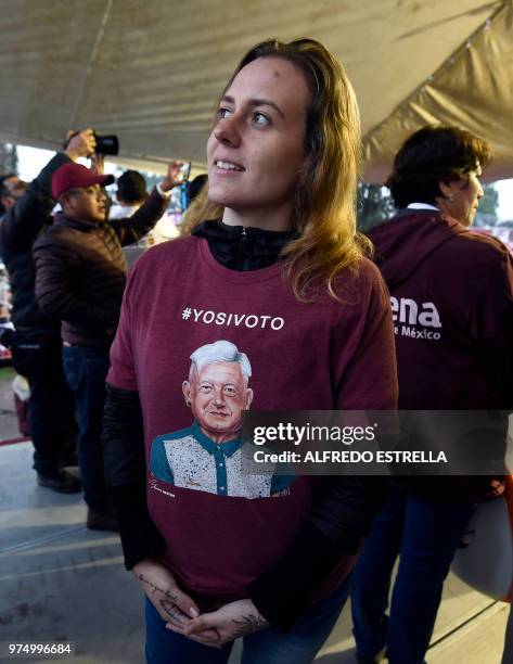 Supporter of Mexican presidential candidate for the MORENA party, Andres Manuel Lopez Obrador, takes part of a campaign rally in Chimalhuacan,State...