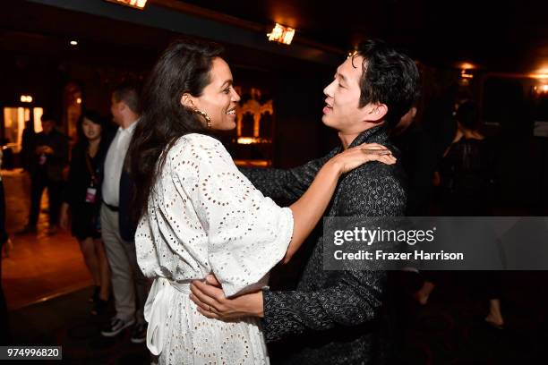 Rosario Dawson and Steven Yeun attend the Sundance Institute at Sundown Summer Benefit at the Ace Hotel on June 14, 2018 in Los Angeles, California.