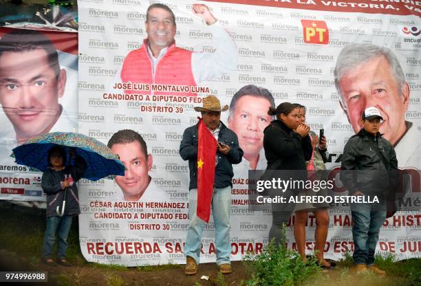 Supporterr of Mexican presidential candidate for the MORENA party, Andres Manuel Lopez Obrador, take part of a campaign rally in Chimalhuacan, State...