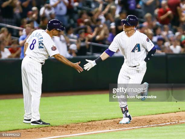 Arizona Diamondbacks third baseman Jake Lamb runs the bases after hitting a homerunduring the MLB baseball game between the Arizona Diamondbacks and...