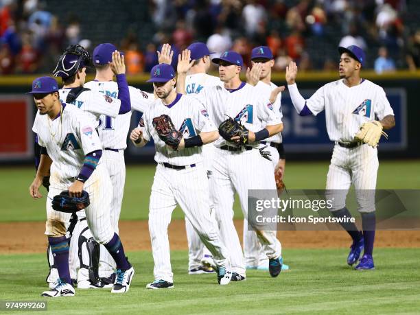 Arizona Diamondbacks players celebrate the win after the MLB baseball game between the Arizona Diamondbacks and the New York Mets on June 14, 2018 at...