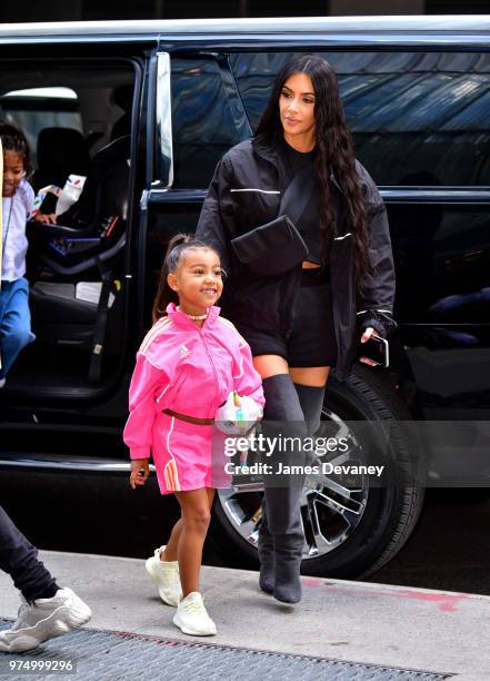 North West and Kim Kardashian seen on the streets of Manhattan on June 14, 2018 in New York City.