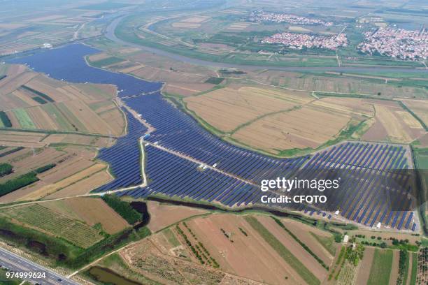 On June 14 binzhou city, shandong province, China, took aerial photography of a large-scale photovoltaic power plant, which combines traditional...