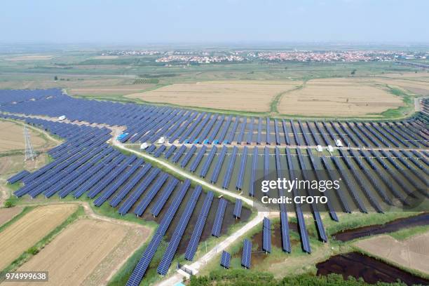 On June 14 binzhou city, shandong province, China, took aerial photography of a large-scale photovoltaic power plant, which combines traditional...