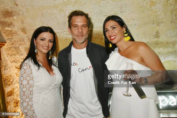 Karine Coccellato, TV presenter Ronald Quintrange from BFM TV and Stephanie Coccellato attend the Archiman Men Body Care Launch Party at 22 Rue de...