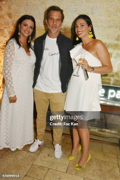 Karine Coccellato, TV presenter Ronald Quintrange from BFM TV and Stephanie Coccellato attend the Archiman Men Body Care Launch Party at 22 Rue de...