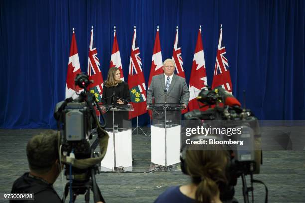 Chrystia Freeland, Canada's minister of foreign affairs, left, speaks as Doug Ford, Ontario's premier-designate, listens during a briefing on North...