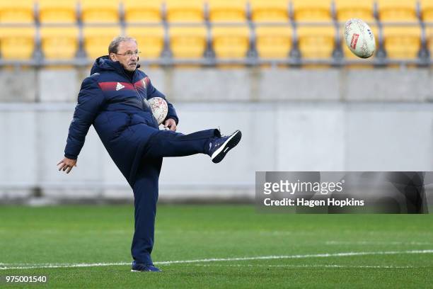 Coach Jacques Brunel kicks during the France Captain's Run at Westpac Stadium on June 15, 2018 in Wellington, New Zealand.