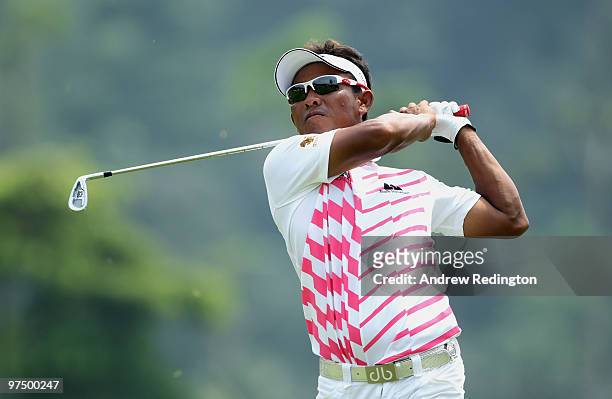 Thongchai Jaidee of Thailand plays his second shot on the sixth hole during the the final round of the Maybank Malaysian Open at the Kuala Lumpur...