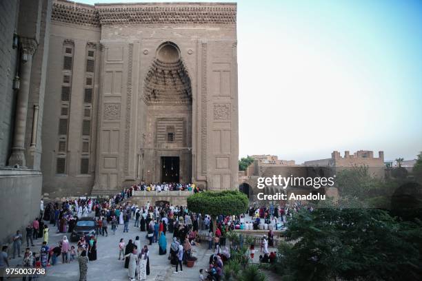 Muslims arrive to perform Eid al-Fitr prayer at Mosque-Madrassa of Sultan Hassan in Cairo, Egypt on June 15, 2018. Eid al-Fitr is a religious holiday...