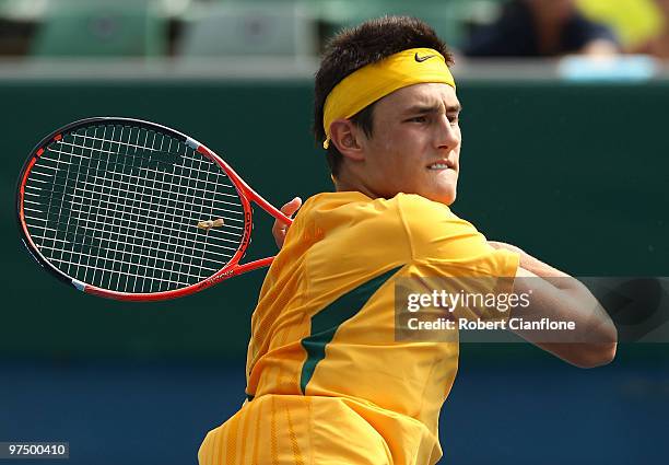 Bernard Tomic of Australia plays a forehand in his match against Hsin-Han Lee of Chinese Taipei during day three of the Davis Cup Asia-Oceania Zone...