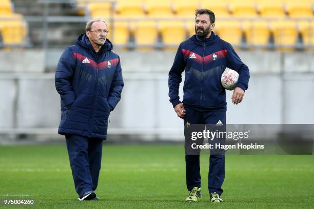 Coach Jacques Brunel and assistant coach Phillippe Doucy look on during the France Captain's Run at Westpac Stadium on June 15, 2018 in Wellington,...