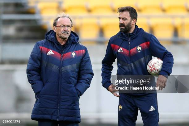 Coach Jacques Brunel and assistant coach Phillippe Doucy look on during the France Captain's Run at Westpac Stadium on June 15, 2018 in Wellington,...