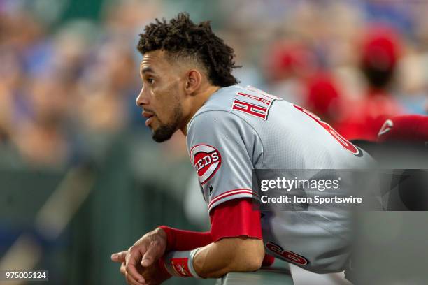 Cincinnati Reds center fielder Billy Hamilton leans over the dugout wall during the MLB interleague game against the Kansas City Royals on June 13,...