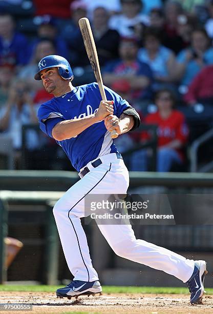Jason Kendall of the Kansas City Royals bats against the Texas Rangers during the MLB spring training game at Surprise Stadium on March 5, 2010 in...
