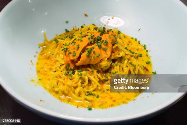 Sea Urchin Pasta is prepared at Ola Cocina del Mar in Singapore, on Thursday, June 7, 2018. Singapore is one of most exciting cities in Asia for...