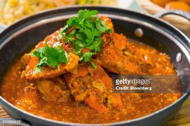 Chilli crab is prepared at Jumbo Seafood restaurant in Singapore, on Friday, June 8, 2018. Singapore is one of most exciting cities in Asia for food,...