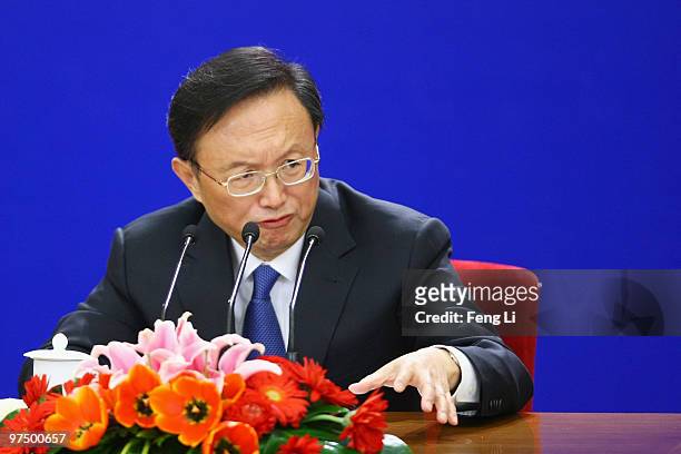 Chinese Foreign Minister Yang Jiechi answers a question during a news conference at The Great Hall Of The People on March 7, 2010 in Beijing, China.
