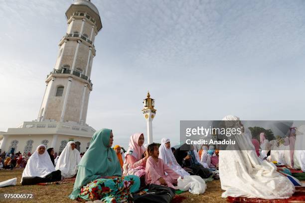Muslims perform Eid al-Fitr prayer at Baiturrahman Grand Mosque, Aceh, Indonesia on June 15, 2018. Eid al-Fitr is a religious holiday celebrated by...