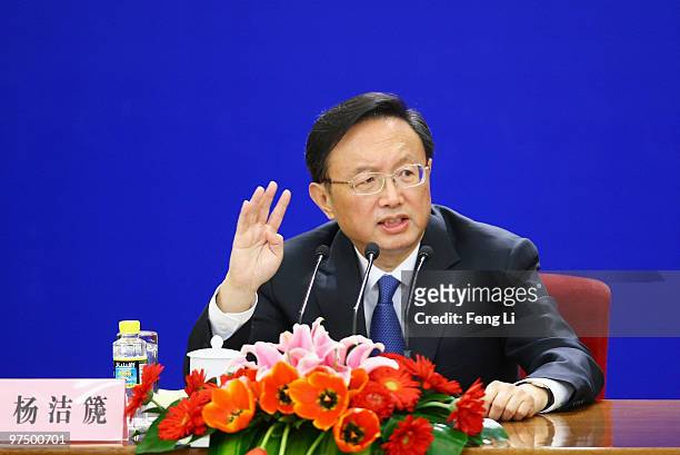 Chinese Foreign Minister Yang Jiechi answers a question during a news conference at The Great Hall Of The People on March 7, 2010 in Beijing, China.