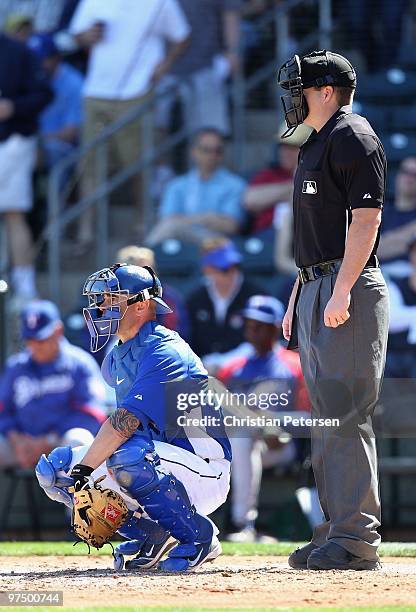 Catcher Jason Kendall of the Kansas City Royals in action during the MLB spring training game against the Texas Rangers at Surprise Stadium on March...