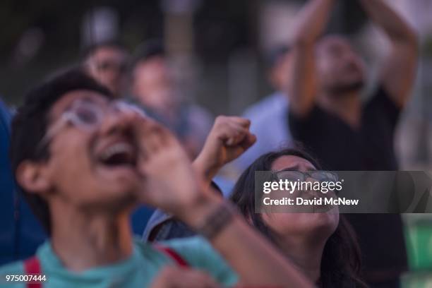 People call "you are not alone" to immigrant detainees inside the Metropolitan Detention Center during a protest of the Trump administration policy...