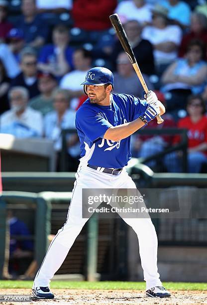 David DeJesus of the Kansas City Royals bats against the Texas Rangers during the MLB spring training game at Surprise Stadium on March 5, 2010 in...