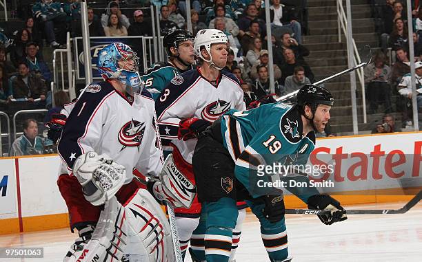 Steve Mason and Marc Methot of the Columbus Blue Jackets defend against Joe Thornton and Dany Heatley of the San Jose Sharks during an NHL game on...