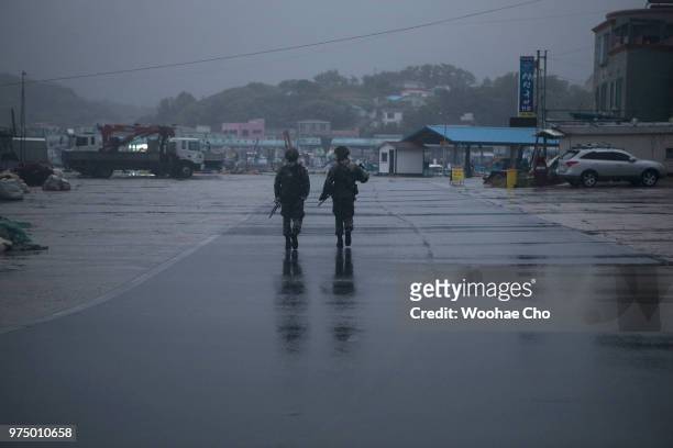 Soldiers patrol near Daejin port on June 10, 2018 in Hyeonnae, South Korea. Around 2,700 South Korean villagers live under tight military defense at...