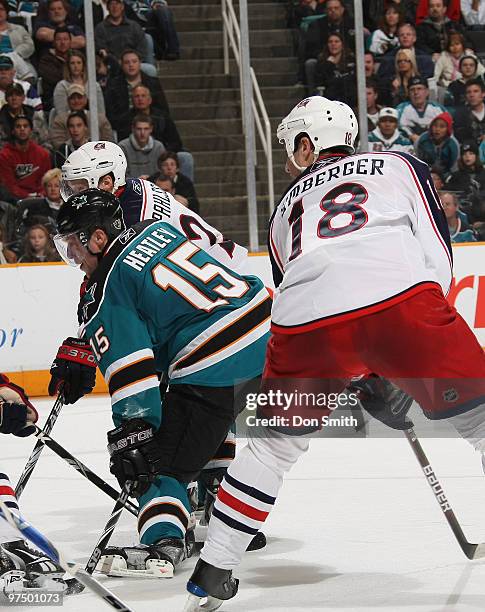 Umberger and Samuel Pahlsson of the Columbus Blue Jackets watch a goal by Dany Heatley of the San Jose Sharks during an NHL game on March 6, 2010 at...