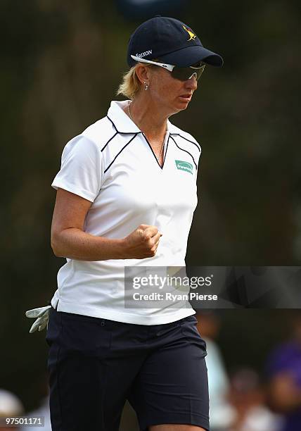 Karrie Webb of Australia celebrates after sinking a birdie putt on the 14th hole during round four of the 2010 ANZ Ladies Masters at Royal Pines...