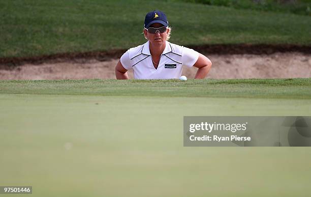 Karrie Webb of Australia lines up a putt on the 15th green during round four of the 2010 ANZ Ladies Masters at Royal Pines Resort on March 7, 2010 in...