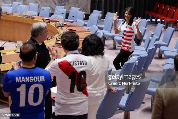 United Nations, New York, USA, June 14 2018 - Security Council members, wearing the jerseys of their national teams, gathered in the chamber today to...