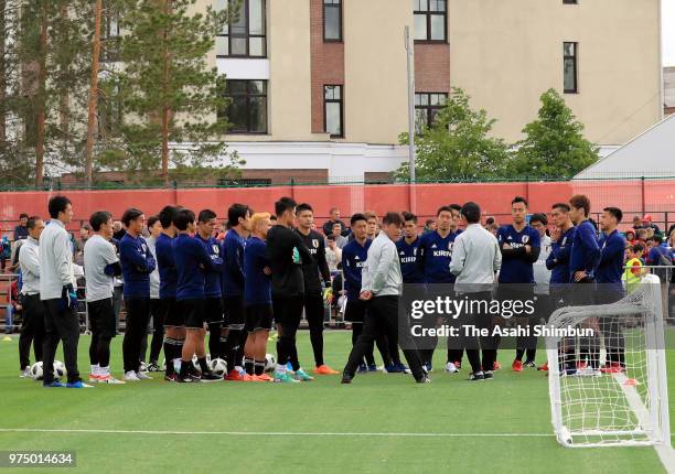 Head coach Akira Nishino of Japan talks to players during the Japan training session on June 14, 2018 in Kazan, Russia.