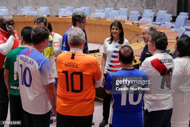 United Nations, New York, USA, June 14 2018 - Security Council members, wearing the jerseys of their national teams, gathered in the chamber today to...