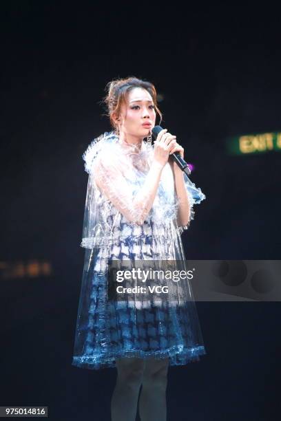 Singer Joey Yung performs on the stage during singer Hins Cheung's 'Hinsideout' live concert at Hong Kong Coliseum on June 14, 2018 in Hong Kong,...