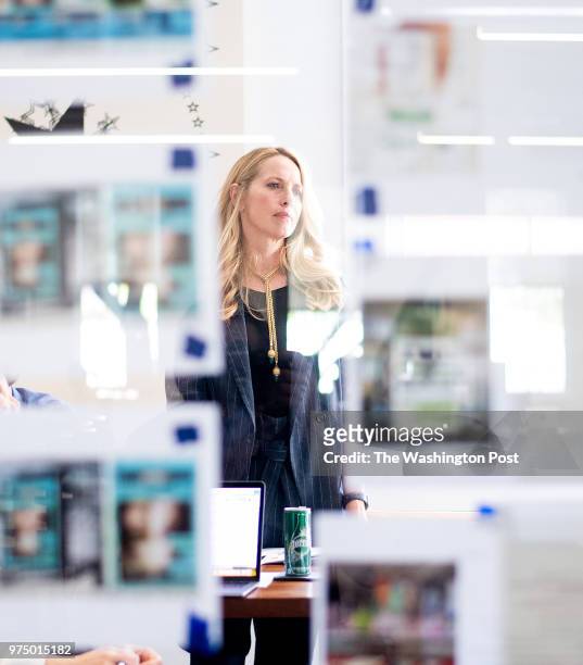 Philanthropist Laurene Powell Jobs meets with workers at XQ, a non-profit funded by her Emerson Collective, in Oakland, California on April 18, 2018.